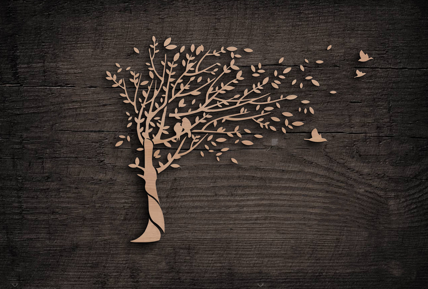 Wooden cutout of a tree with birds on a dark wooden background