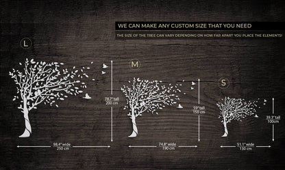 Diagram showing different sizes of tree-shaped wall decals with measurements on a dark background.