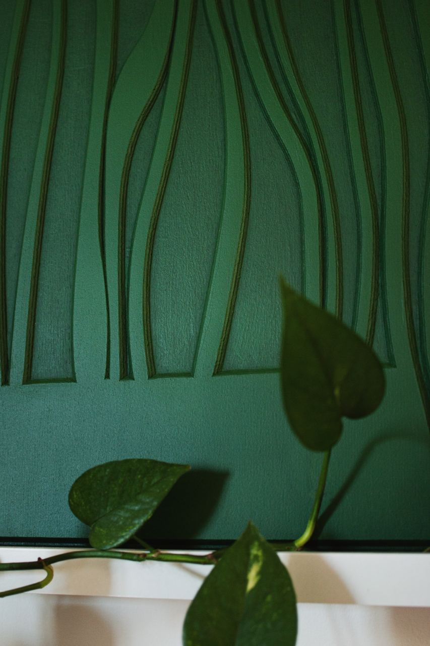 Botanical inspired green wood panel for home interior