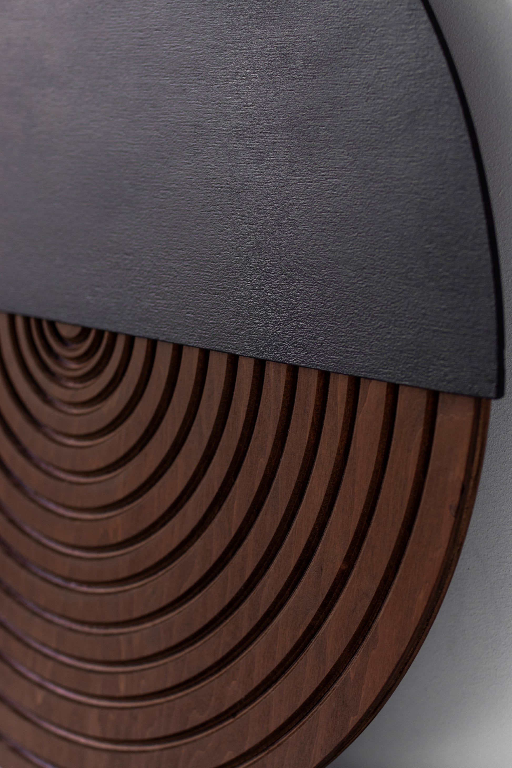 Round wood wall decor with half circle minimalist design