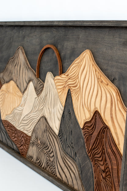 Handcrafted carved mountain panels for modern wall décor.