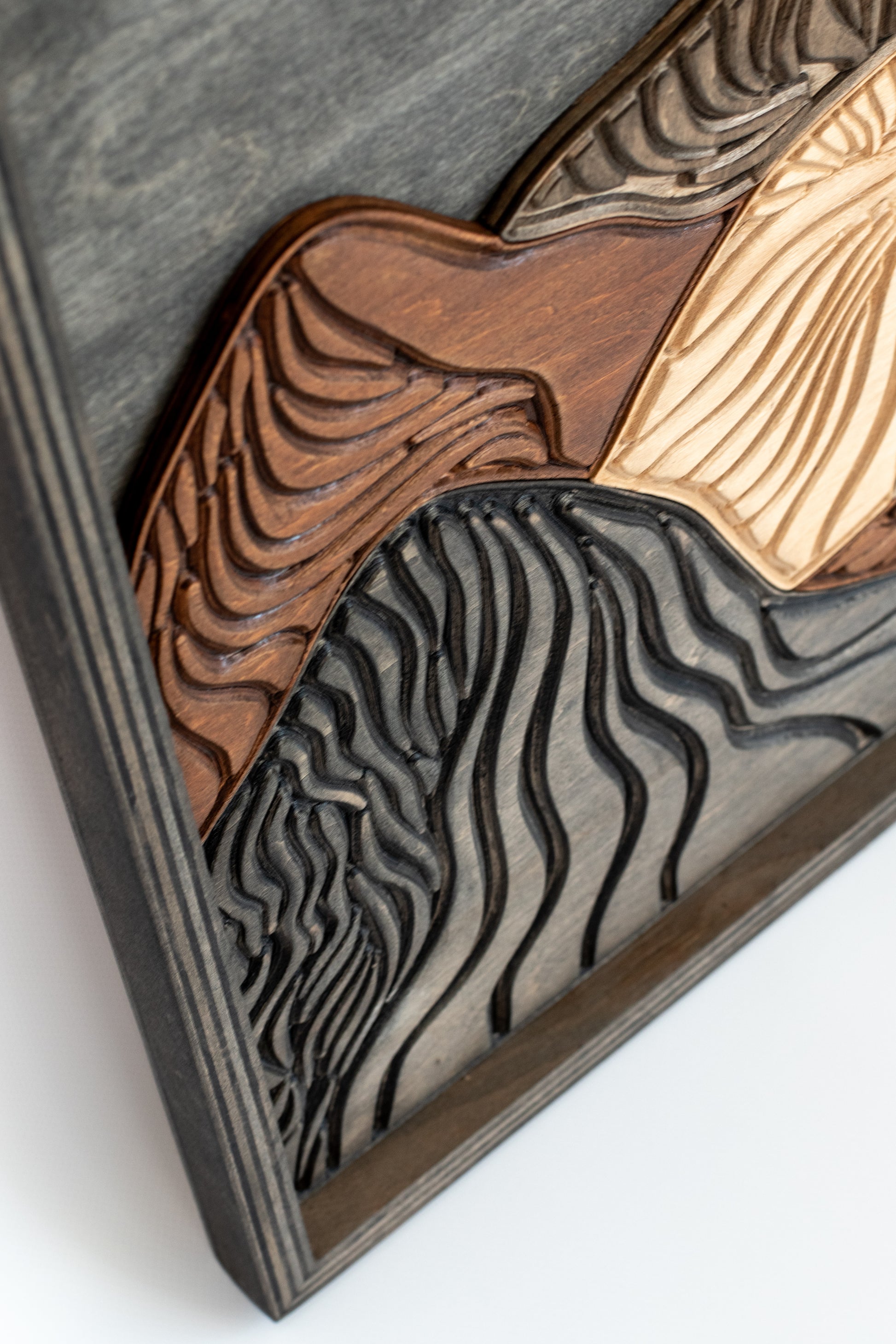 Carved wood mountain wall art