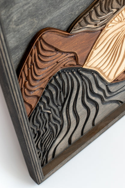 Carved wood mountain wall art