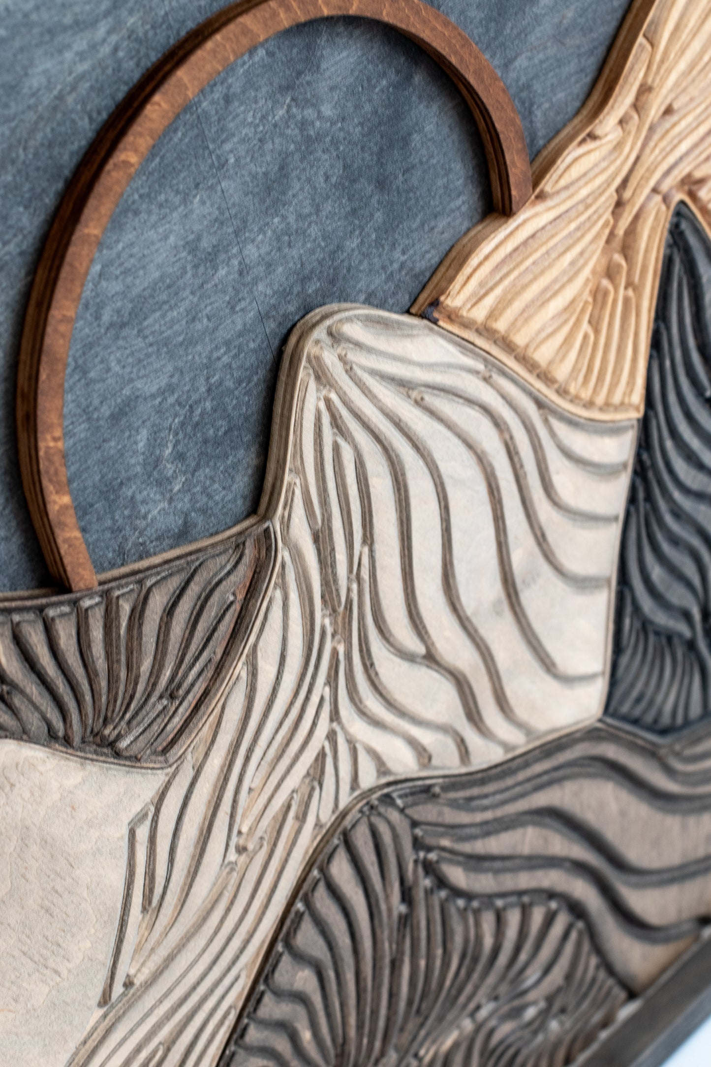 Nature-inspired wooden mountain silhouette artwork, handcrafted to add warmth and outdoor vibes to living rooms, offices, or cabins.