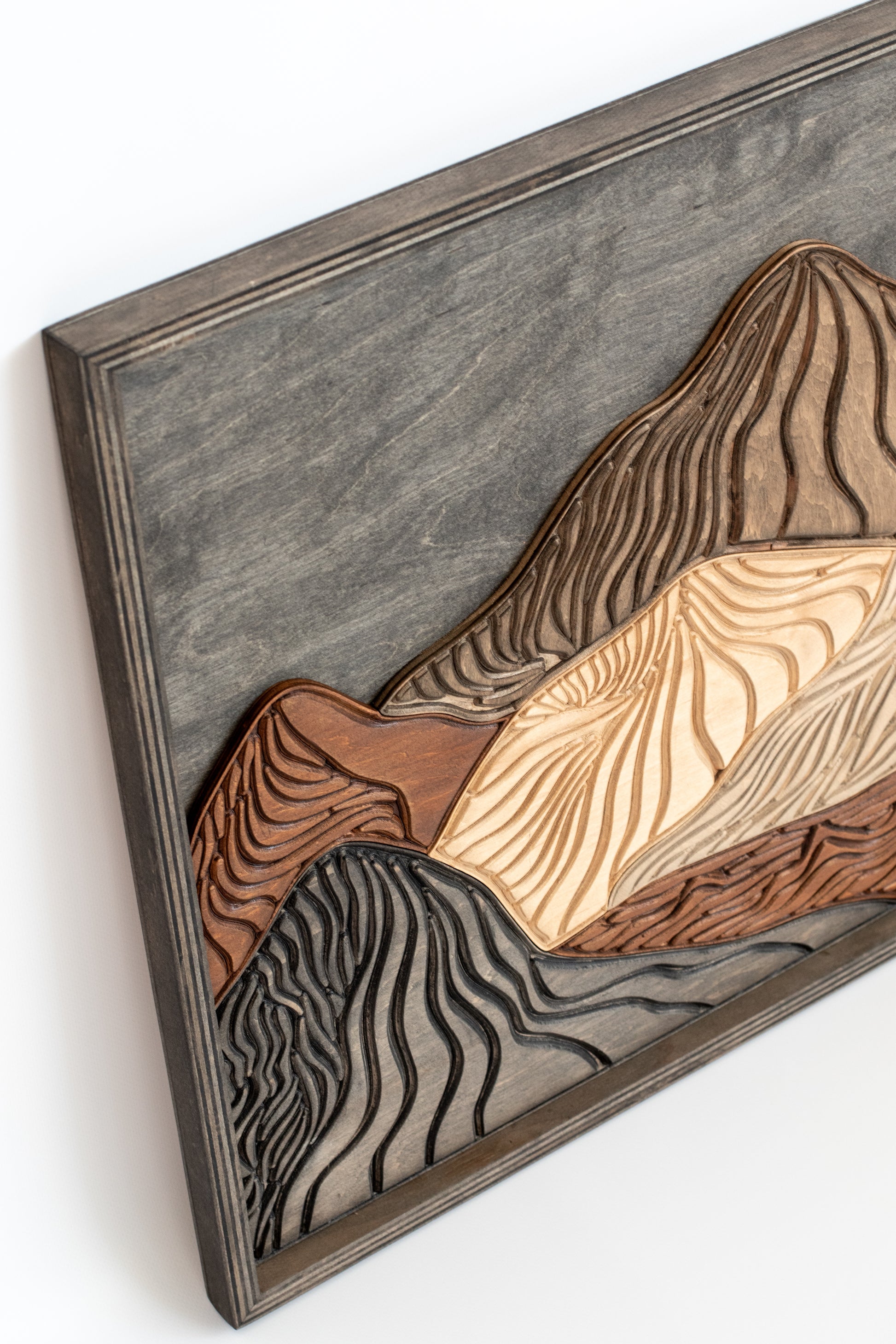 Decorative wooden mountain landscape artwork with 3D layered design, crafted for cozy cabin walls or nature-inspired home décor.