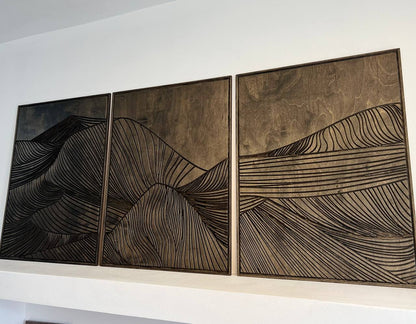 Carved wood mountain triptych