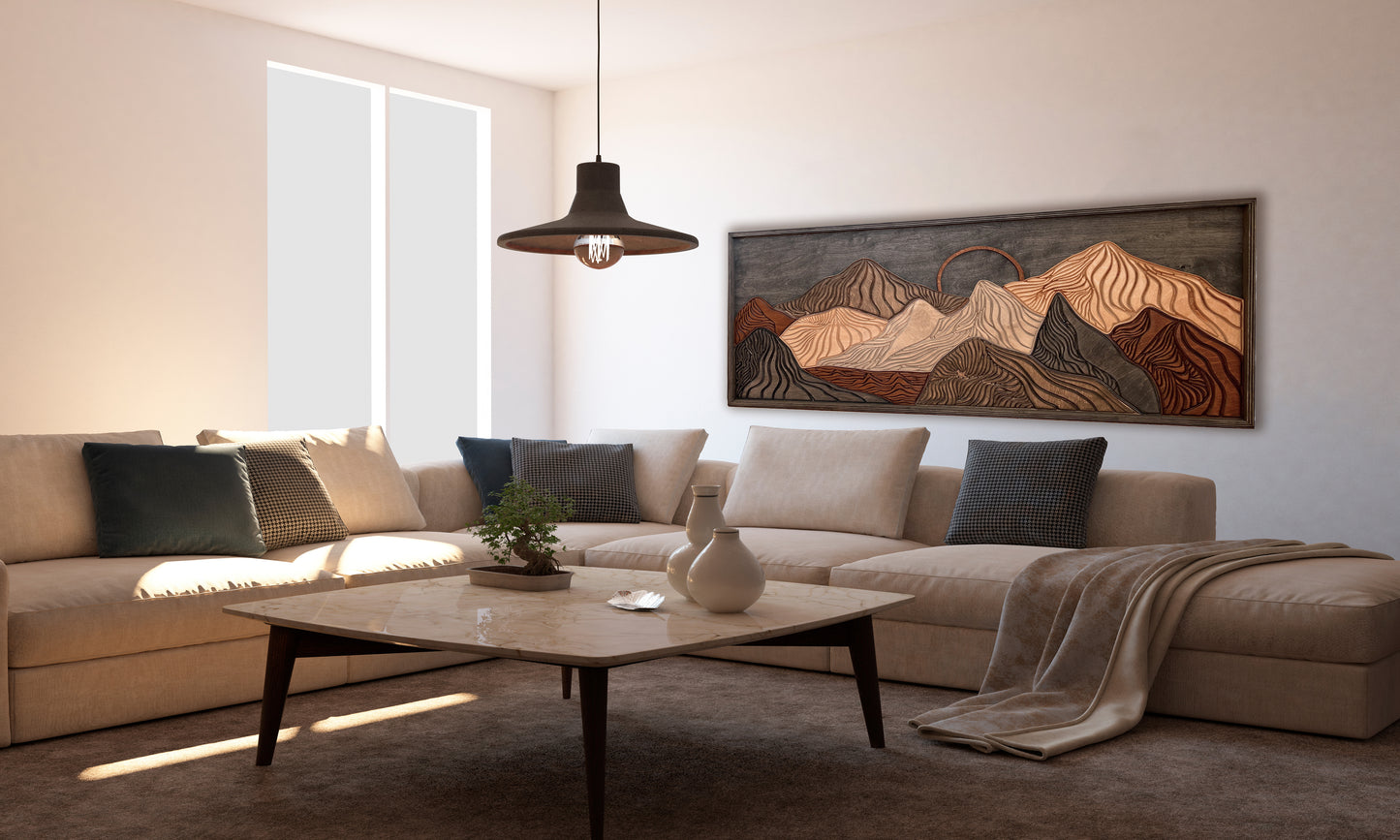 Layered wooden mountain silhouette décor with geometric design.