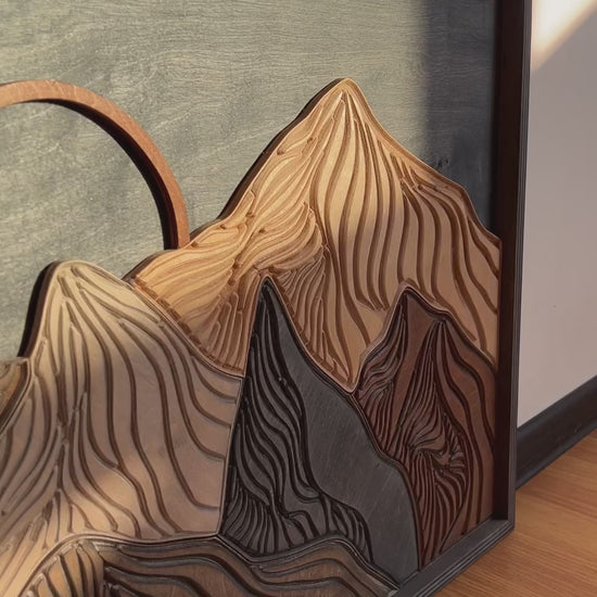 Rustic handmade wood mountain wall hanging with multi-tone wood stains, ideal for living rooms, nurseries, and adventure-themed interiors.