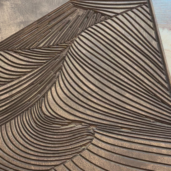 Decorative carved wood mountain triptych with detailed contours and elegant shading, created for nature-inspired home décor.